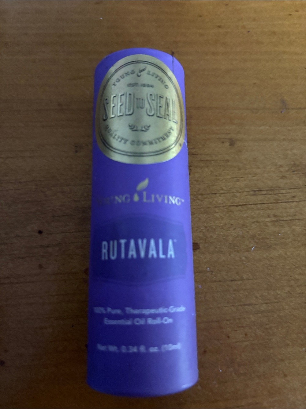 Young Living Rutavala Roll-On in Purple with Gold Seal